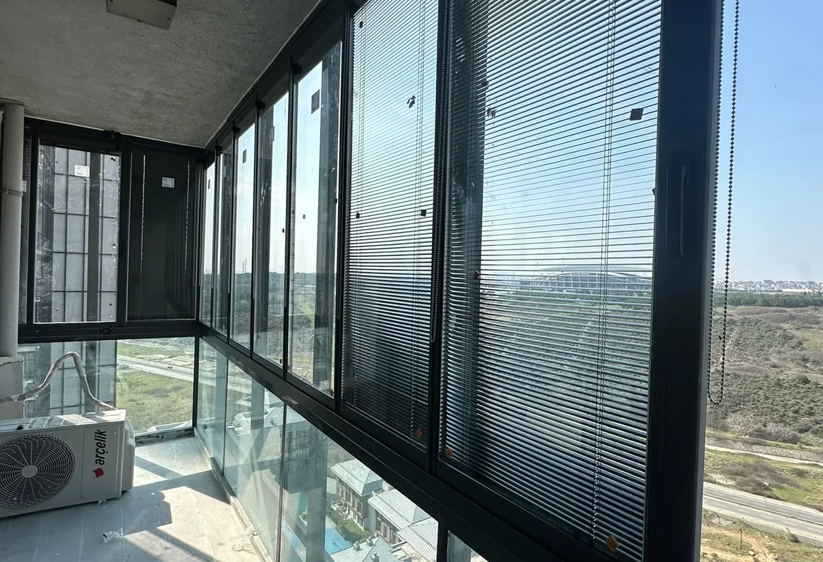 Yüksek katta ısıcamlı katlanır cam balkon uygulaması