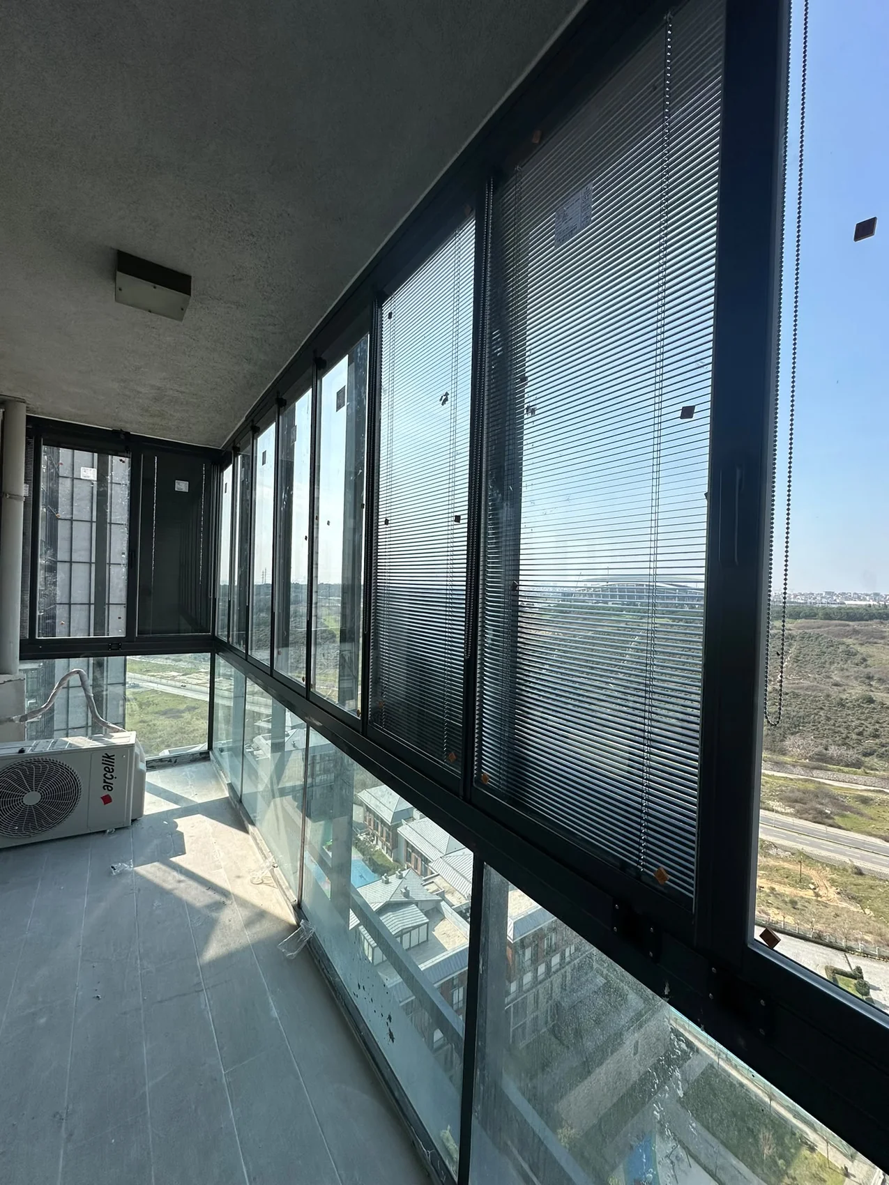 Yüksek katta ısıcamlı katlanır cam balkon uygulaması
